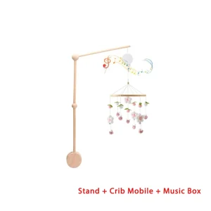 Träspjälsängsmobil med björn i mjuk filt – vaggande musiklåda och hängfäste