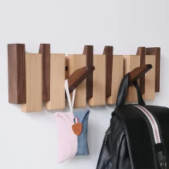 Väggmonterad träkrokställ med 8 krokar – pianotangentdesign