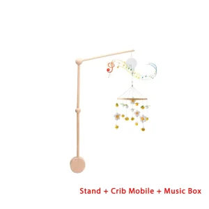 Träspjälsängsmobil med björn i mjuk filt – vaggande musiklåda och hängfäste