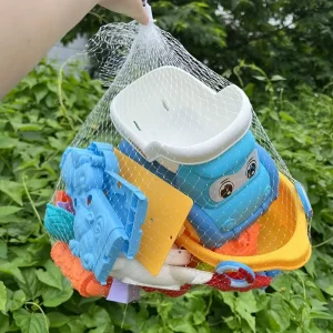 Strandleksaker för barn: Sandsats med hink, spade, kratta och djur-/dinosaurieformar