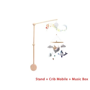 Träspjälsängsmobil med björn i mjuk filt – vaggande musiklåda och hängfäste