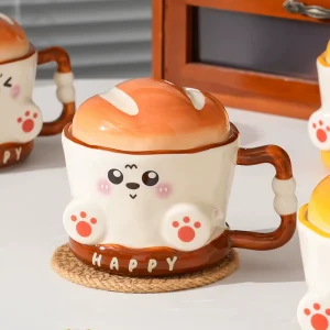 Brödkopp i keramik med gullig design för hem, kontor och present