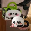 Keramikmugg med panda­motiv, lock och sked för hem och kontor