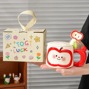 Söt keramisk äppelmugg med lock och sked