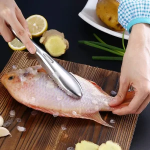 Fiskfjällssrapa i rostfritt stål med ergonomiskt handtag 11 Fiskfjällssrapa i rostfritt stål med ergonomiskt handtag