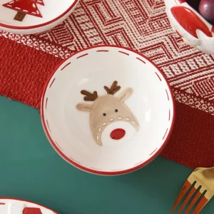 Julskål i keramik med julmotiv, präglad design och flera motiv