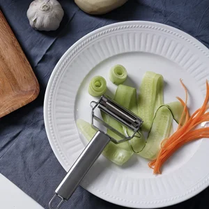 Multifunktionell grönsaks- och fruktskalare i rostfritt stål med julienne