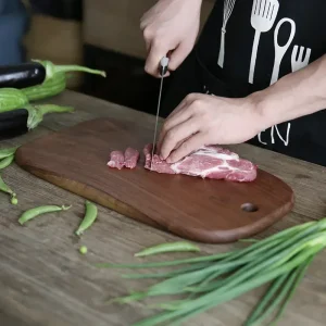 Skärbräda i valnöt med handtag, för bröd och frukt