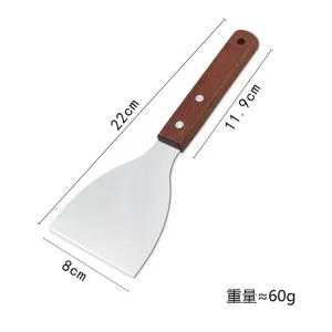 Stekspade i rostfritt stål med grillskrapa och trähandtag