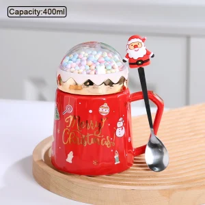 Julmugg i keramik med tomte, ren och snögubbe – handmålad