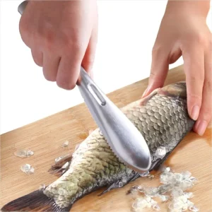 Fiskfjällssrapa i rostfritt stål med ergonomiskt handtag