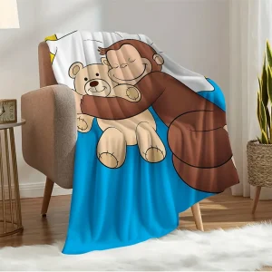 Curious George-blanket i coral fleece – mjuk, varm och lekfull