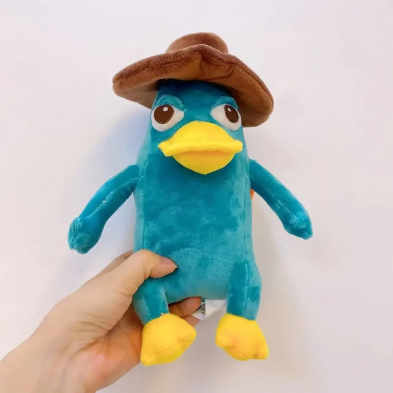 Perry gosedjur, platypus-plyschfigur från film och TV med turkos kropp, brun hatt och gula detaljer