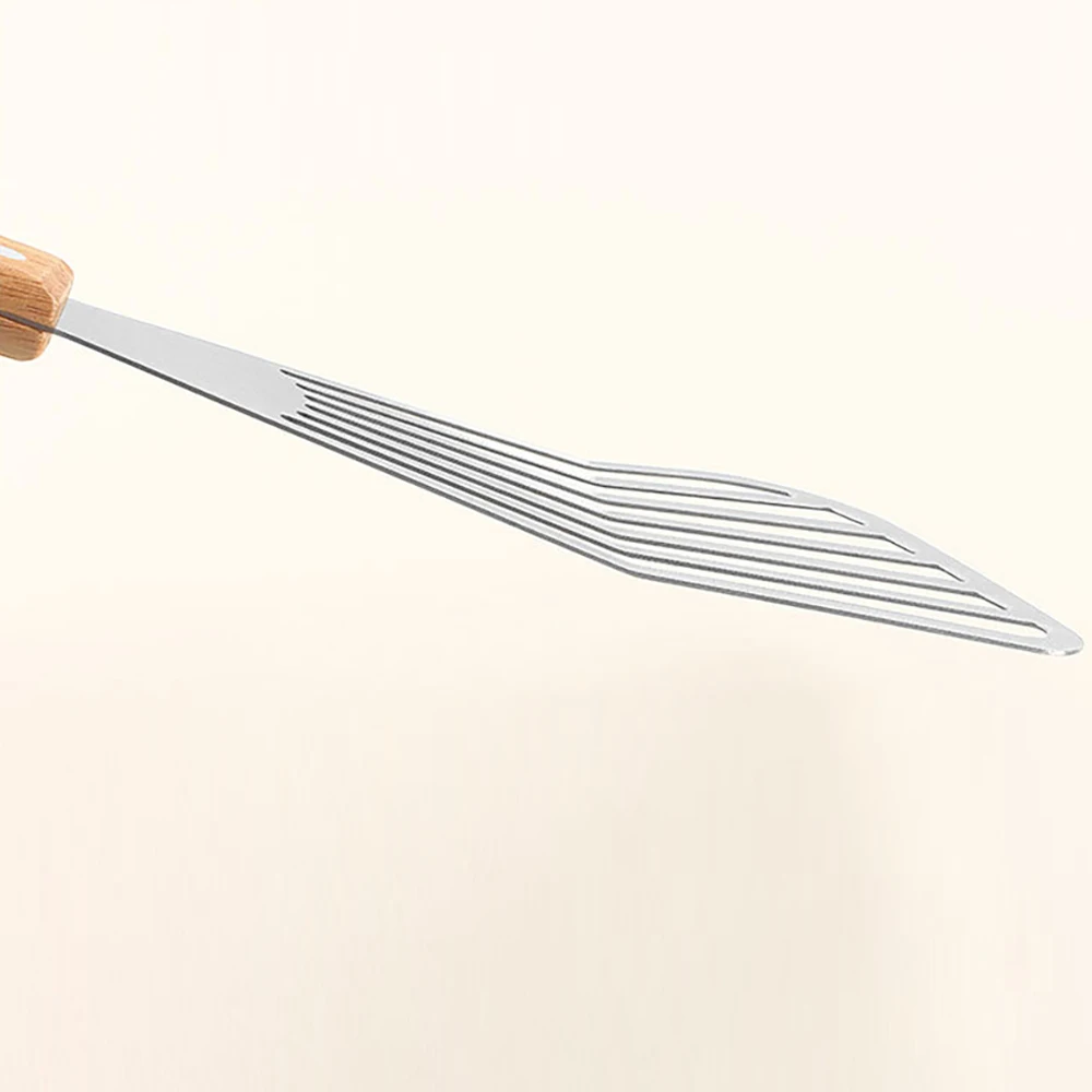 Stekspade i rostfritt stål för fisk med trähandtag, fläktformad 6 Stekspade i rostfritt stål för fisk med trähandtag, fläktformad - Bild 6