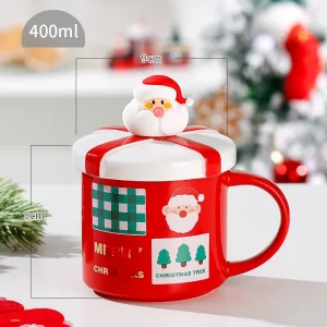 Julmugg i keramik med tomte, ren och snögubbe – handmålad