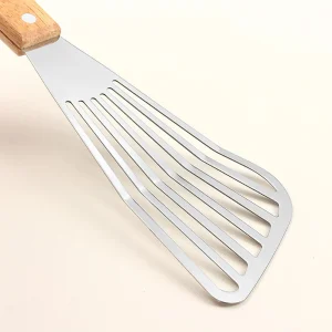 Stekspade i rostfritt stål för fisk med trähandtag, fläktformad 12 Stekspade i rostfritt stål för fisk med trähandtag, fläktformad