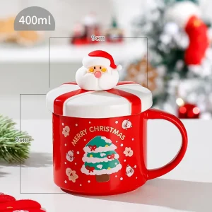 Julmugg i keramik med tomte, ren och snögubbe – handmålad