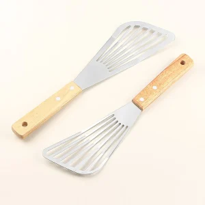 Stekspade i rostfritt stål för fisk med trähandtag, fläktformad 10 Stekspade i rostfritt stål för fisk med trähandtag, fläktformad