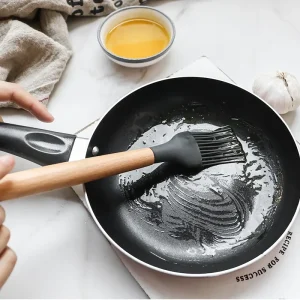 12-delars silikonköksredskapset med non-stick och trähandtag