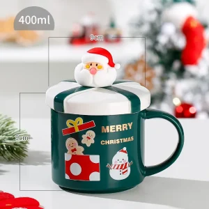 Julmugg i keramik med tomte, ren och snögubbe – handmålad