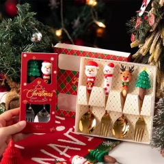 Julbestickset med tomte och snögubbe – dessertsked, gaffel och kniv