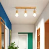 Justerbar nordisk LED-spotlight i trä med 1 eller 3 huvuden
