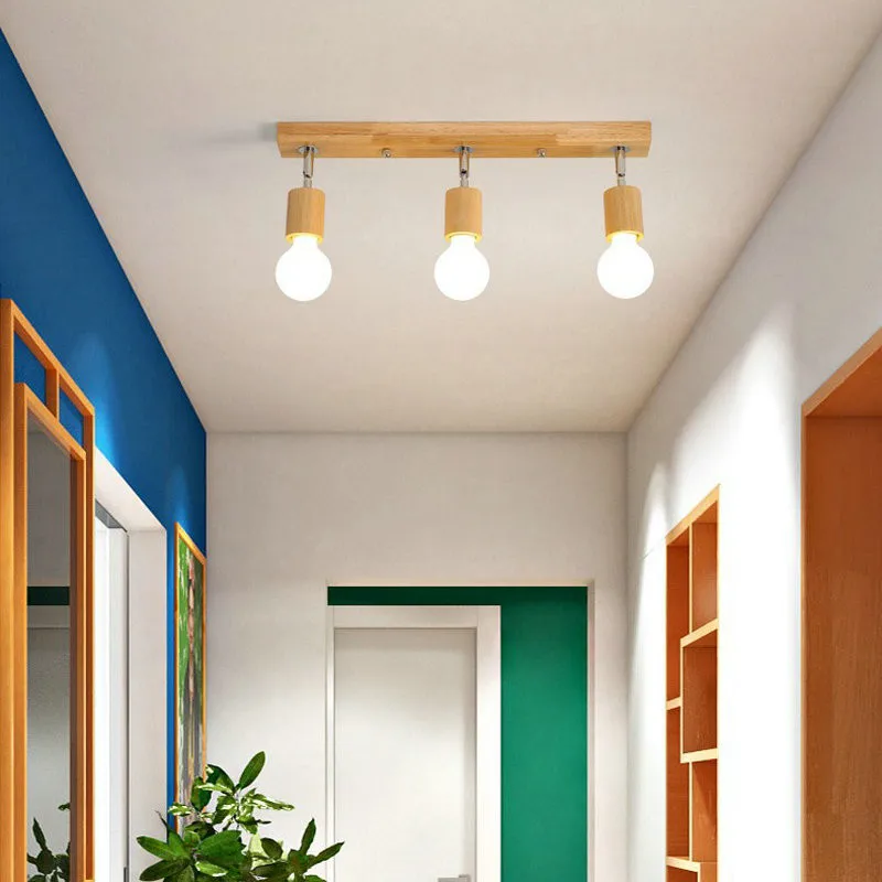 Justerbar nordisk LED-spotlight i trä med 1 eller 3 huvuden 1 Justerbar nordisk LED-spotlight i trä med 1 eller 3 huvuden