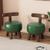 Modern låg pall i massivt trä med klädd sits för hall och vardagsrum