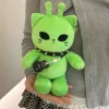 Grönt alienkatt-gosedjur 25–27 cm i mjuk plysch med gitarrdetalj 18 Grönt alienkatt-gosedjur 25–27 cm i mjuk plysch med gitarrdetalj
