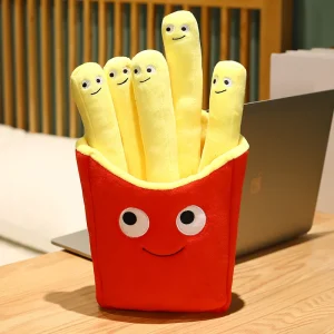 Flera figurvarianter av leende pommes frites som tröstande gosedjur och plyschkudde