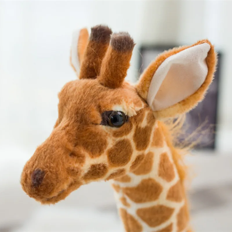 Ett stort giraffe gosedjur i verklighetstrogen design, 35–120 cm, som present till barn 4 Ett stort giraffe gosedjur i verklighetstrogen design, 35–120 cm, som present till barn - Bild 4