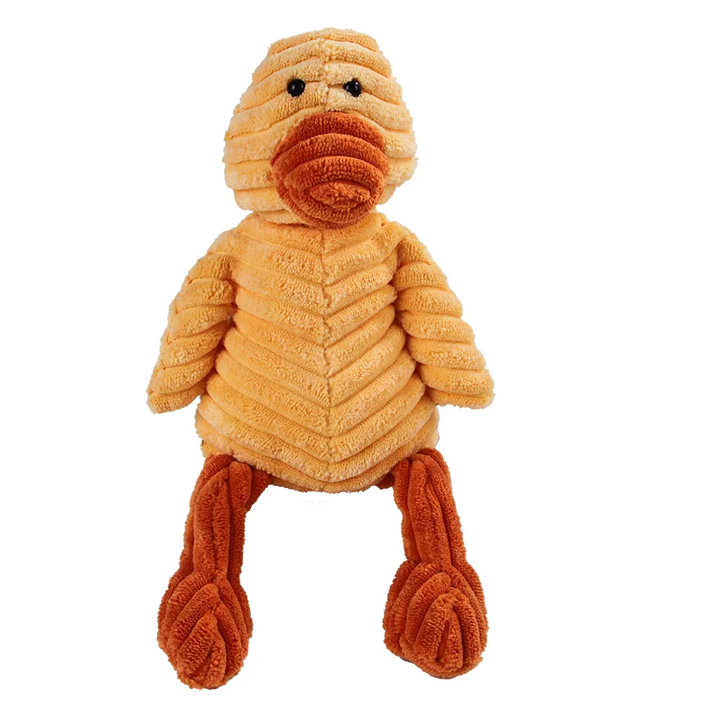 Djurfigurer som husdjursleksak 51 Gulorange räfflad mjukisfigur med runt huvud och framträdande nosparti.