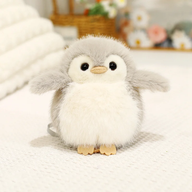 Pingvin och uggla gosedjur med upprätt form, magneter och kawaii-stil, 12 cm 19 Vitgrå pingvinplysch med utsträckta vingar och gula fötter.