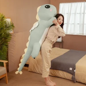 Alternative view of Stort och mjukt dinosaurie gosedjur som lång kramkudde med söt tecknad ängeldesign