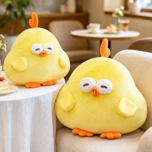 Gult Dundun-gosedjur som kawaii kuddfigur, ett tecknat kyckling gosedjur för barn