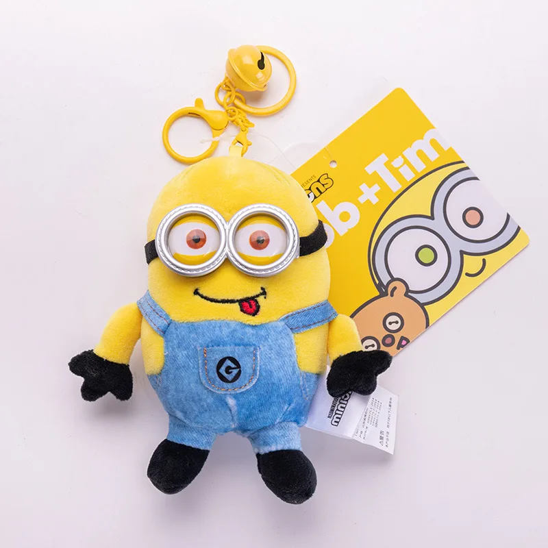Minions tecknade plyschfigur som kawaii-nyckelring, hänge för ryggsäck och present 25 Liten gul plyschfigur med blå denimoveraller i hängaccessoarformat.