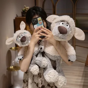 Sömnigt får gosedjur som kudde, kamouflerad varg i fårskrud från Muppets