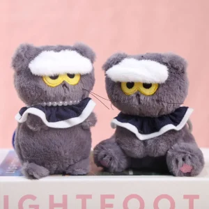 Kattgosedjur som nyckelring med molnmotiv och argt animeuttryck i kawaii-stil