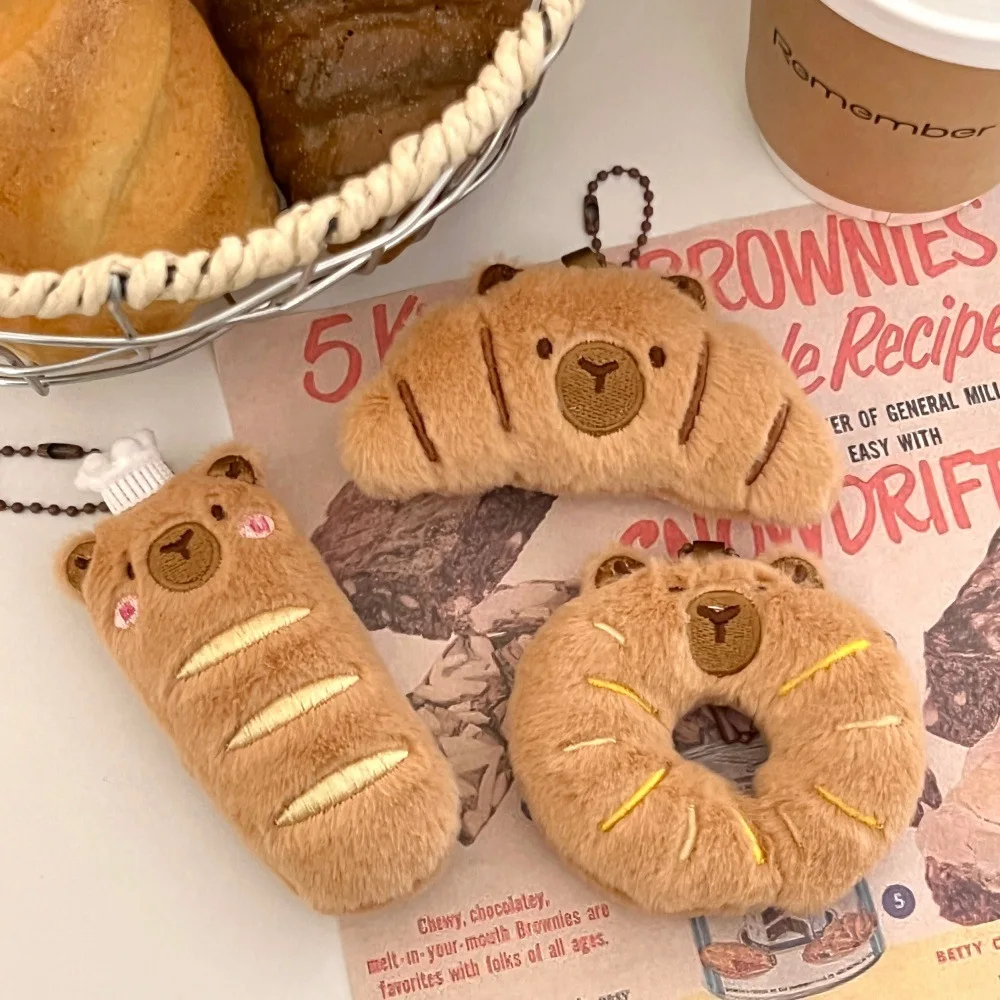 Kapybara- och delfinhängen i tecknad stil med bröd- och matmotiv samt kreativ design 2 Kapybara- och delfinhängen i tecknad stil med bröd- och matmotiv samt kreativ design - Bild 2