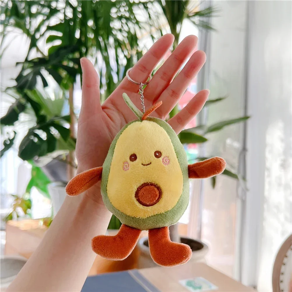Söt avokadomjukis i flera varianter, kawaii-nyckelring och väskhänge, 12 cm 21 Visa avokadoplyschens storlek i handen och dess hängkedja.