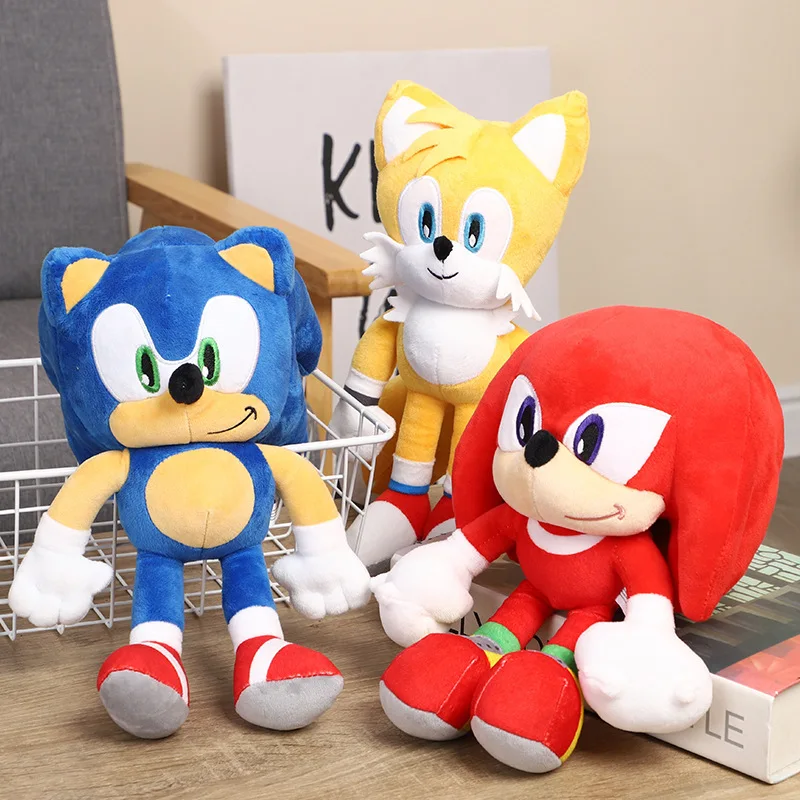 Sonic the Hedgehog gosedjur, med Amy Rose, Knuckles och Tails i tecknad stil, 30 cm 26 Tre färgglada karaktärsfigurer i plysch visas tillsammans.