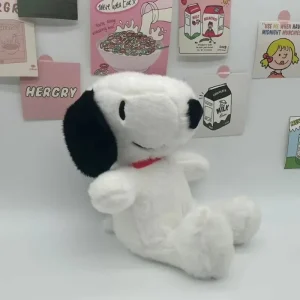 Kramvänlig hundkudde med Snoopy som gosedjur, i söt tecknad stil för soffans ryggstöd