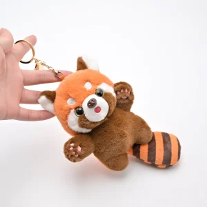Söt röd panda och tvättbjörn i tecknad stil, hängfigur och nyckelring för ryggsäck