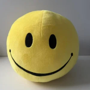 Gult gosedjur med smileyansikte i flera figurvarianter, extra stor rund plyschkudde