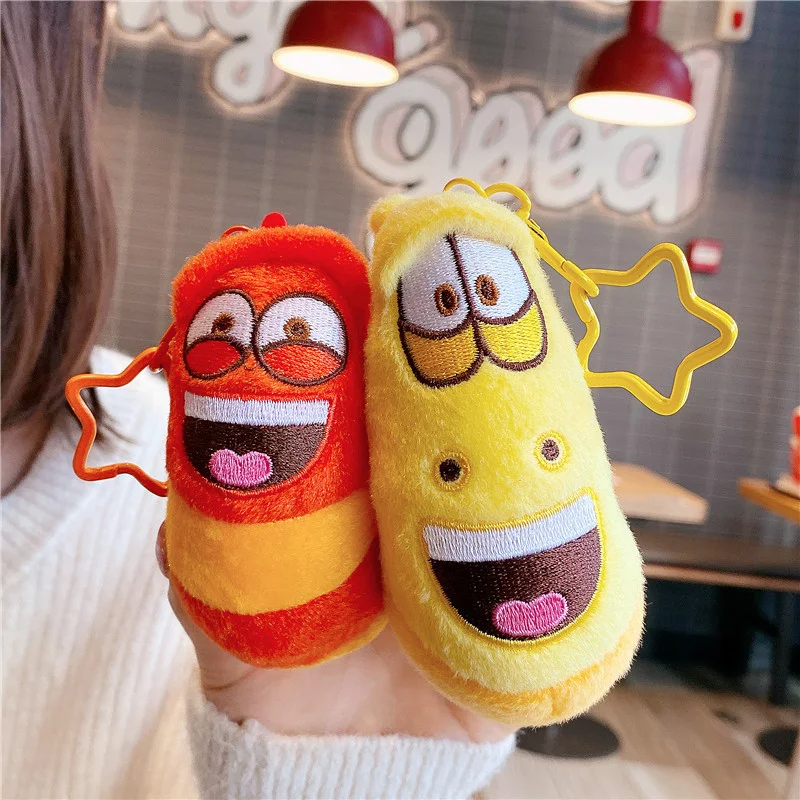 Larva-nyckelring med snigelfigur som kreativ mjukis i lekfull anime- och seriestil 3 Larva-nyckelring med snigelfigur som kreativ mjukis i lekfull anime- och seriestil - Bild 3