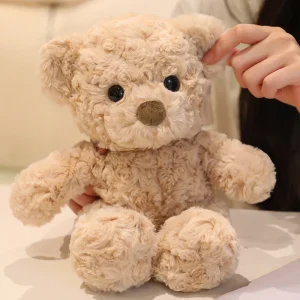 Björn gosedjur med söt, lockig päls i brun färg och lugnande funktion, 30 cm