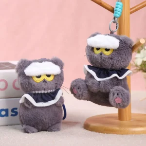 Kattgosedjur som nyckelring med molnmotiv och argt animeuttryck i kawaii-stil