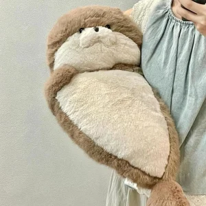 Mjuk kudde och säl gosedjur som havsutter i verklighetstrogen kawaii-stil, blåbrun