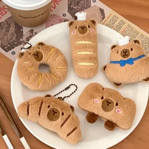 Kapybara- och delfinhängen i tecknad stil med bröd- och matmotiv samt kreativ design 19 Kapybara- och delfinhängen i tecknad stil med bröd- och matmotiv samt kreativ design
