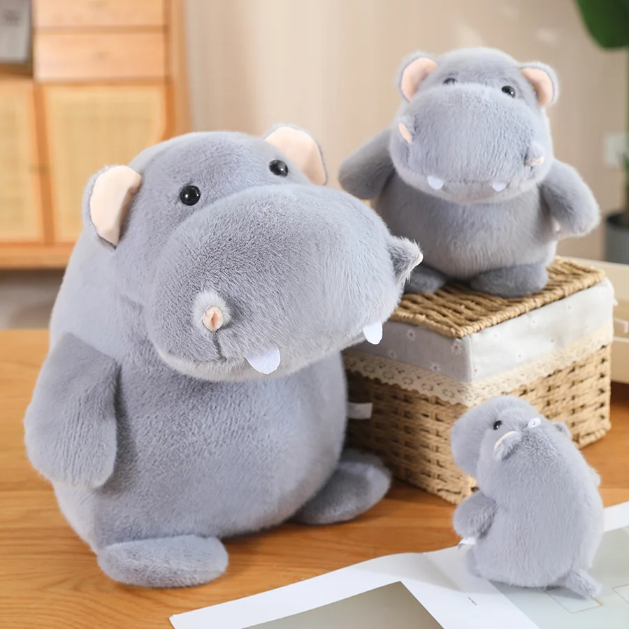 Hippopotamus gosedjur, fluffig plyschkudde med gullig tecknad design, 12–35 cm 18 Visa de ljusgrå flodhästgosedjuren i olika storlekar.